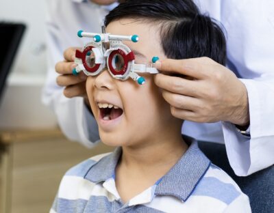 An,Asian,Ophthalmologist,Examines,The,Child’s,Vision.,An,Optometrist,Examines